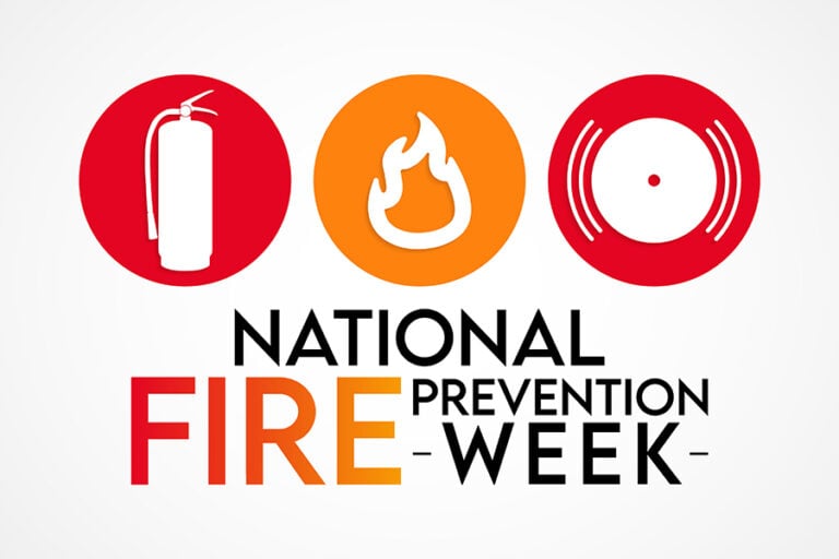 National Fire Prevention Week graphic with fire extinguisher, flame, and smoke detector symbols.
