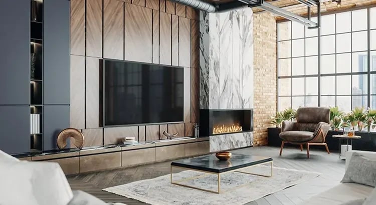 A modern living room with a large flat-screen TV mounted on the wall. The room features a stylish fireplace, contemporary furniture, and large windows allowing natural light to flood the space.