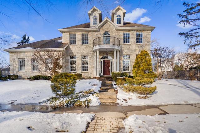 You'll treasure the space and style of this classic Hinsdale home