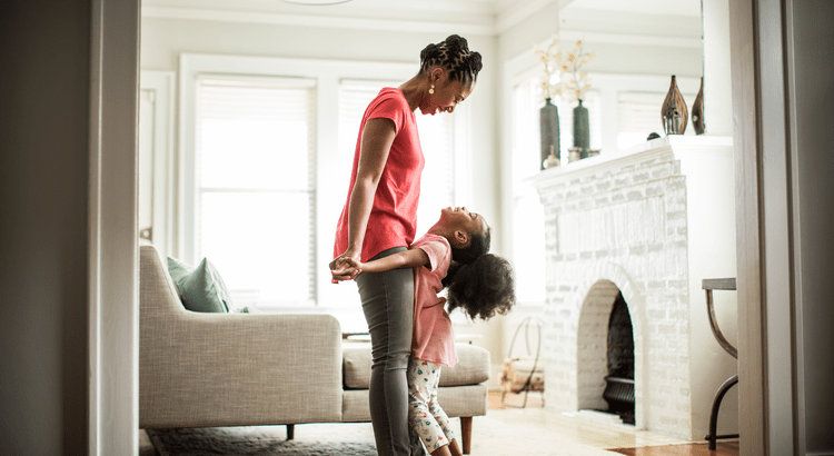 A woman interacting with a child in a home setting, likely related to the various needs and uses of a home. 