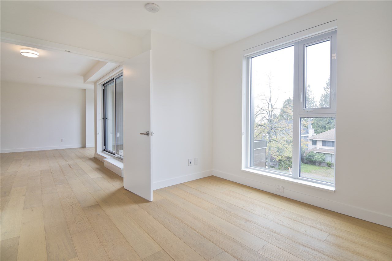 303-7128 Adera St