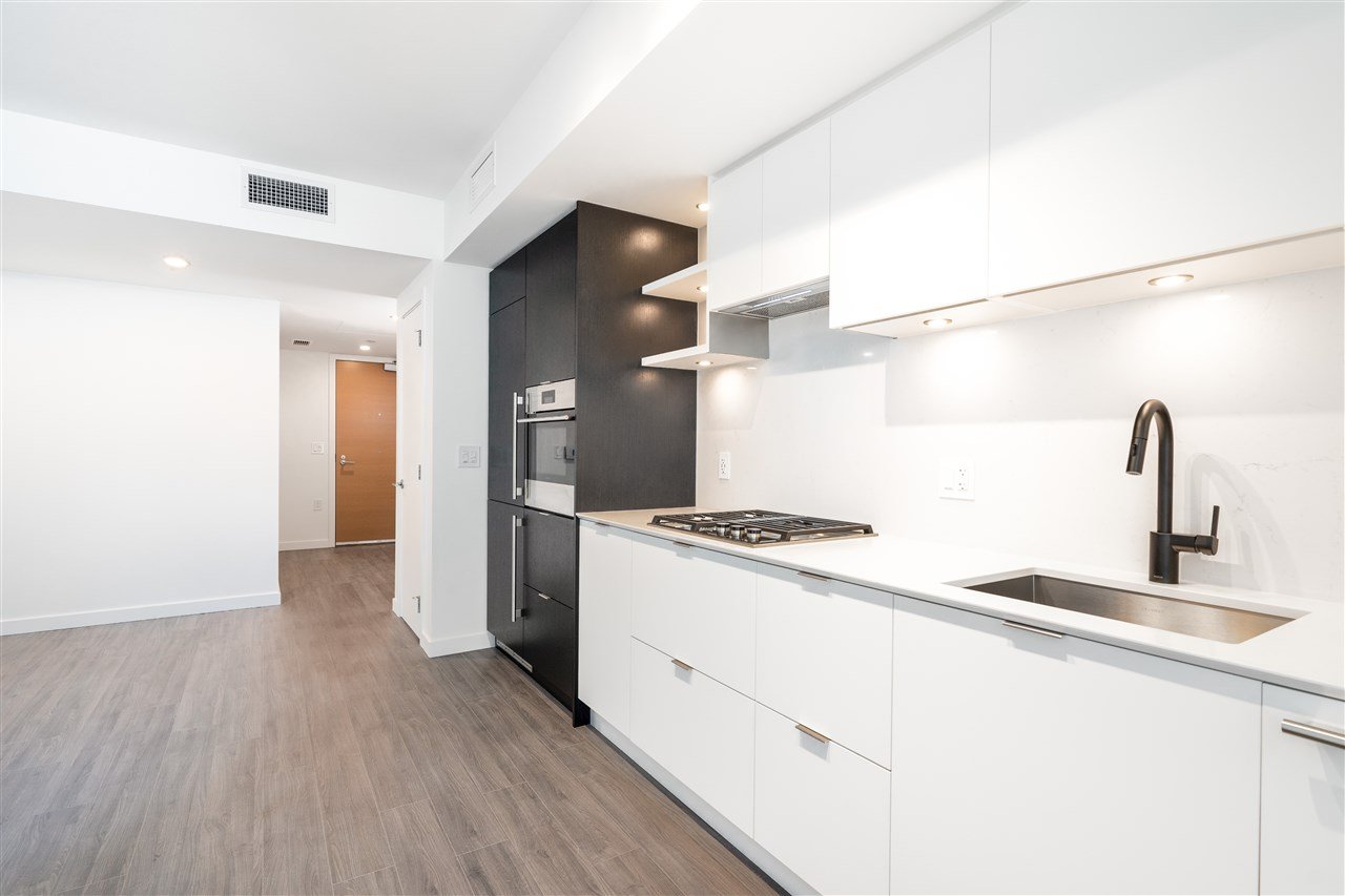 411-210 E 5th Ave