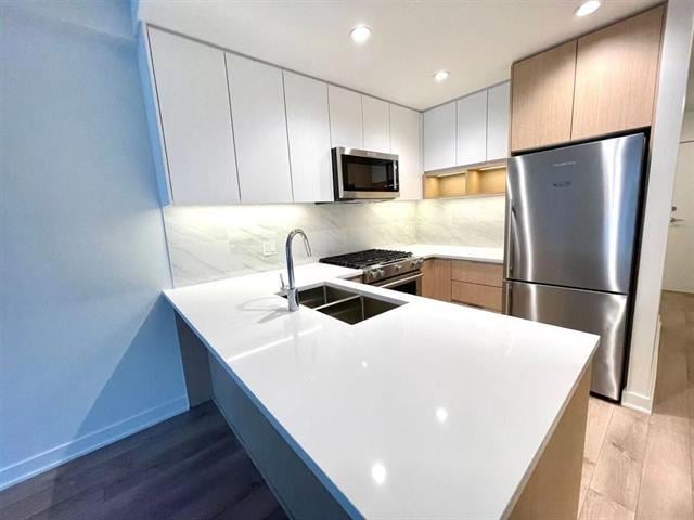 207-8940 University Cres