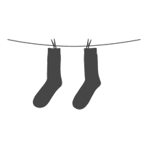 Two socks hang from a clothesline.