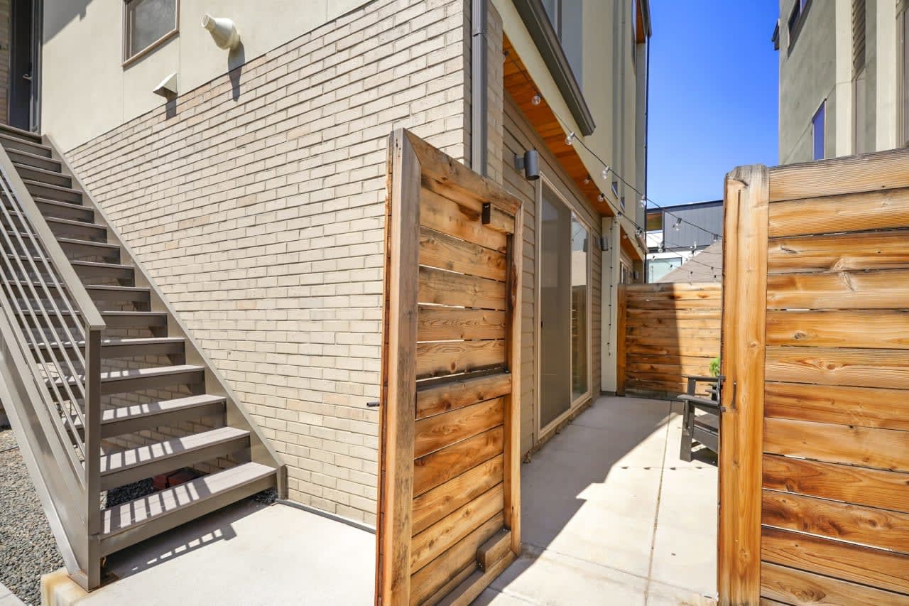 Showings start today! Tastefully updated Five Points townhome