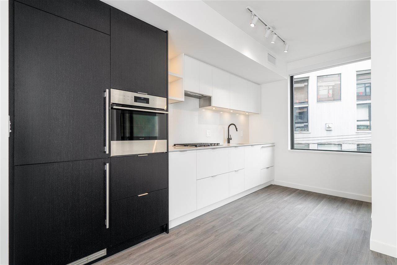 411-210 E 5th Ave