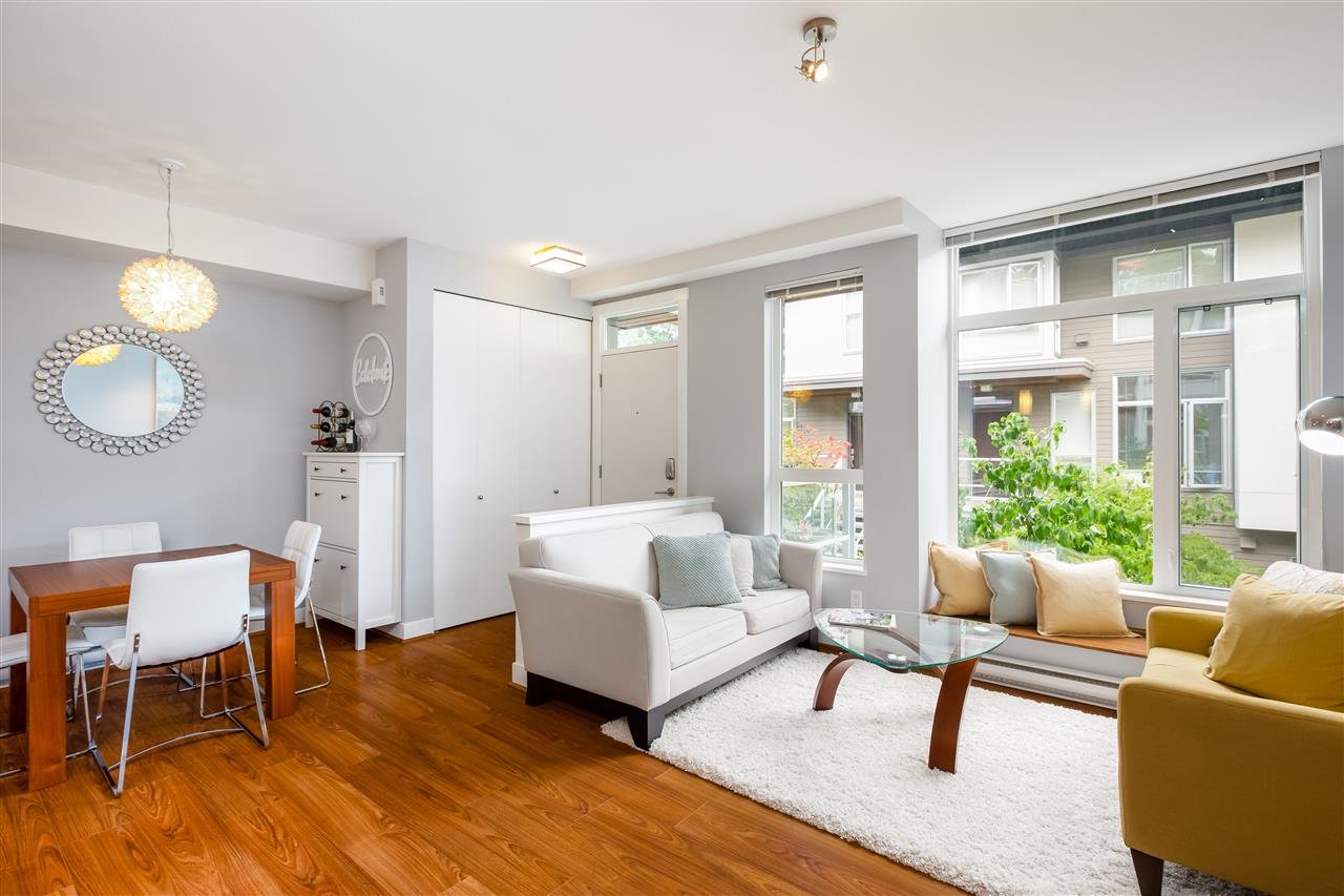 208-735 W 15th St