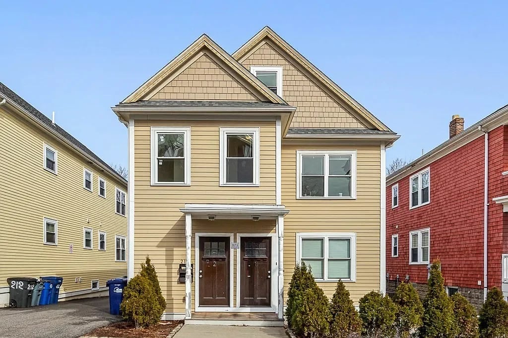 American Foursquare yellow home