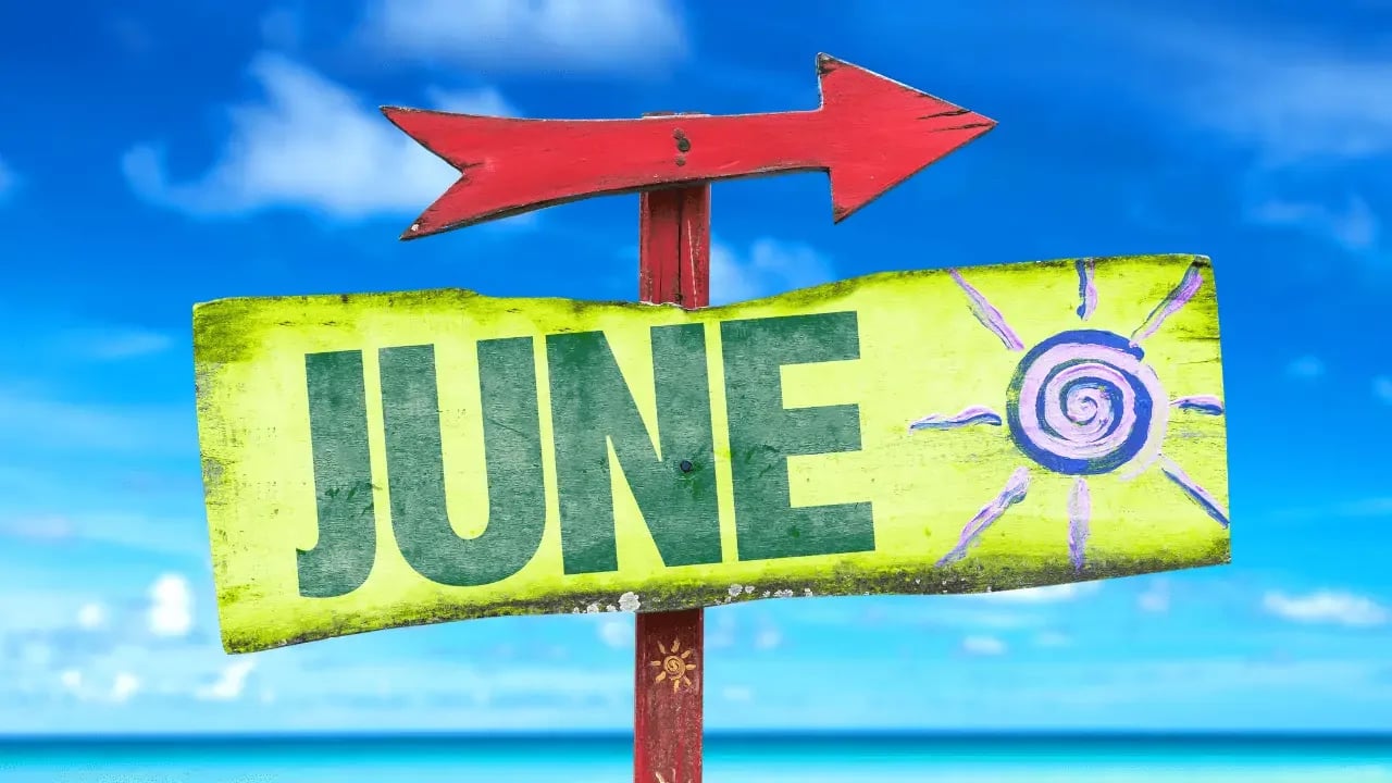 A colorful sign with the word "JUNE" written on it, along with a sun symbol and a red arrow pointing to the right. This image represents the month of June, likely highlighting summer or events happening in June.
