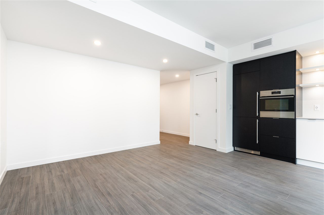 411-210 E 5th Ave
