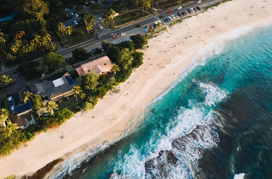 aerial view of a house by the beach