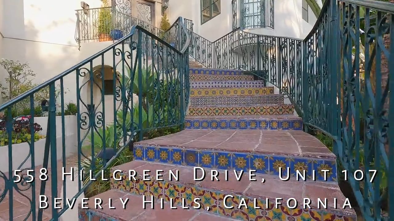 A photo of the entrance to a Mediterranean-style building at 558 Hillgreen Drive, Unit 107 in Beverly Hills, California