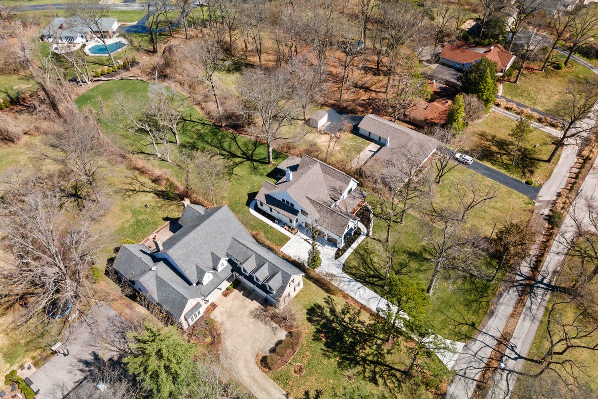 Drone photo of modern farmhouse in Town and Country.