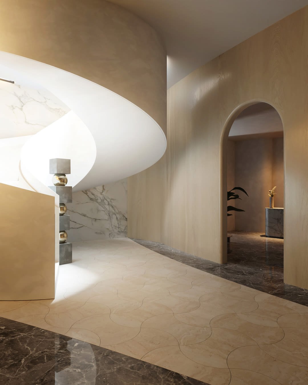 Residential lobby with a sweeping white ceiling, marble finishes, and an arched passageway.