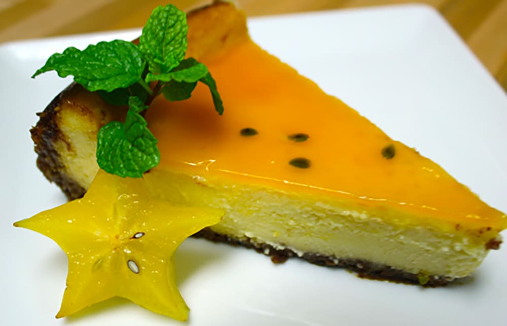 Coconut Cheesecake with Lilikoi Glaze