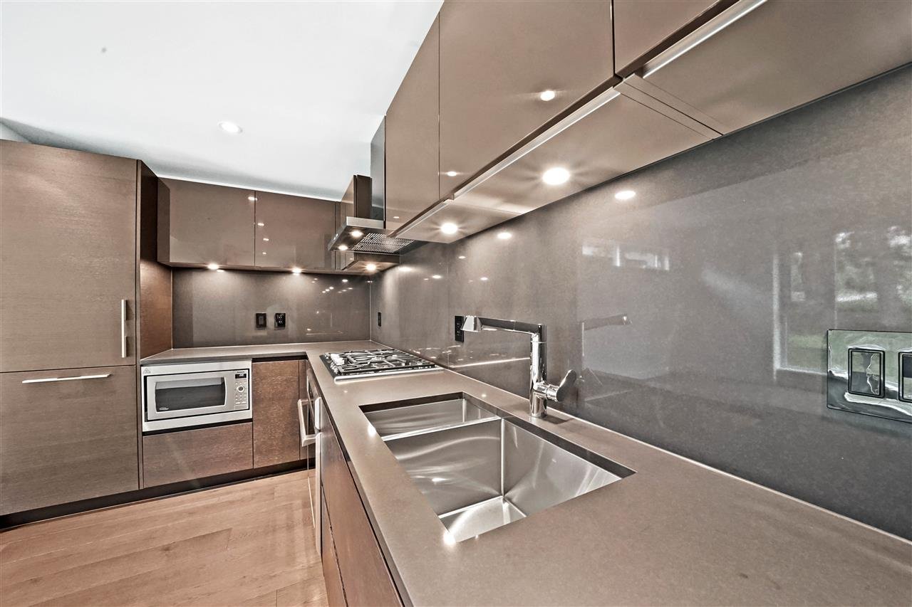203-7128 Adera St