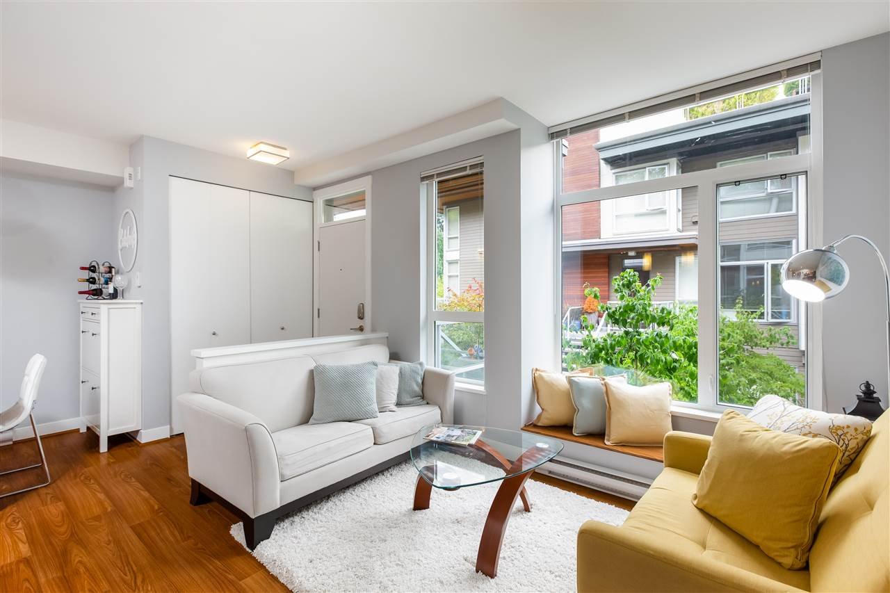 208-735 W 15th St