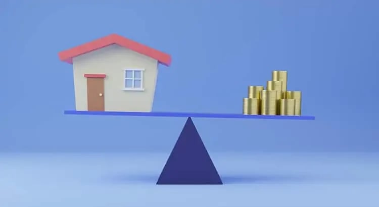 A blue balance scale with a house on one side and a stack of gold bars on the other, representing a metaphor for weighing the value of property or investments.