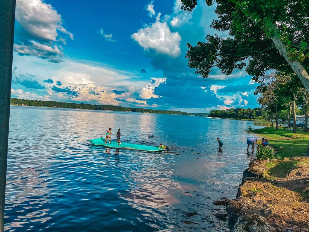 Paddle Boarding and Swimming on Lake Tyler