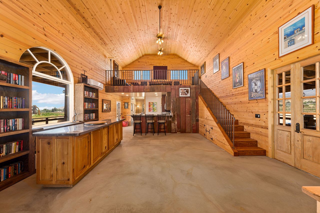 Interior of the barn event space at a Los Angeles winery estate, showcasing its charm.