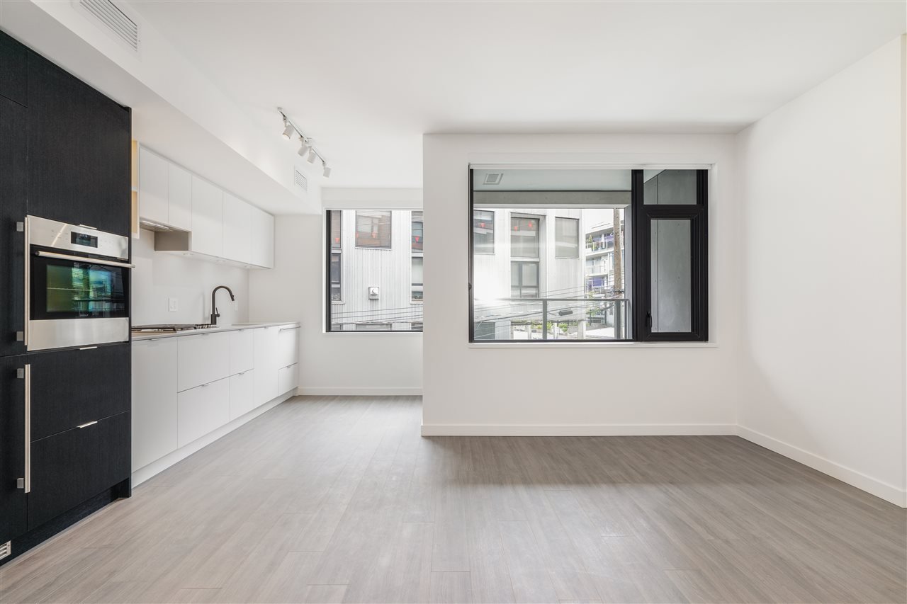 411-210 E 5th Ave