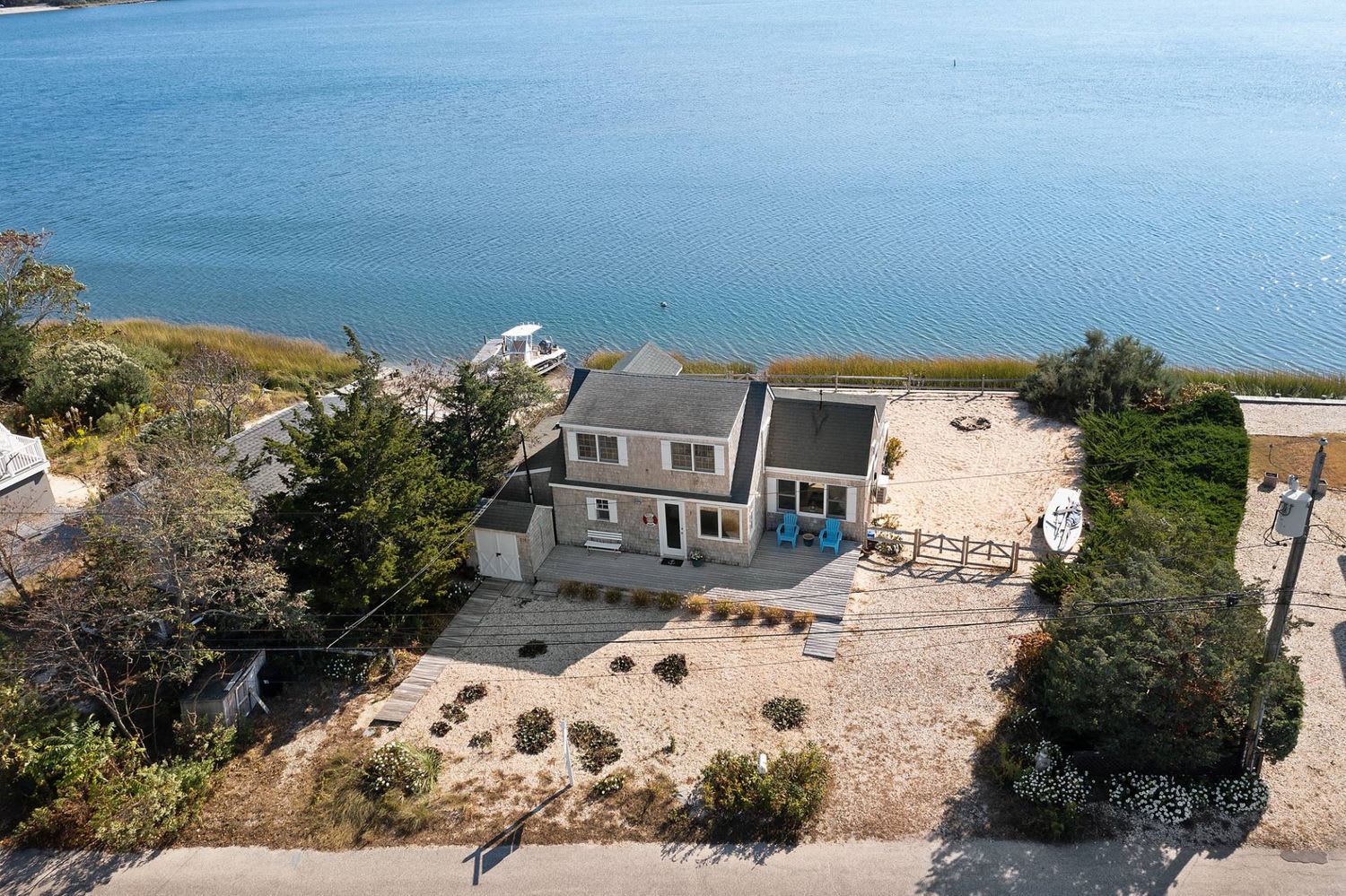 Panoramic Waterfront Vistas in a Coveted Harborside Neighborhood