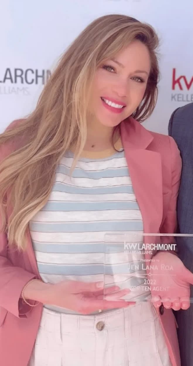 Jen Lana Roa receiving Top 10 Agent award at KW Larchmont