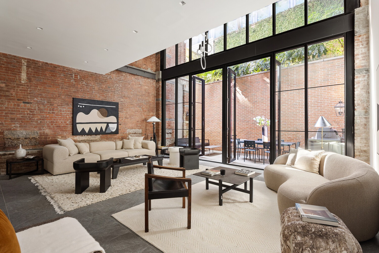 Double-height living room at 41 Great Jones Maisonette