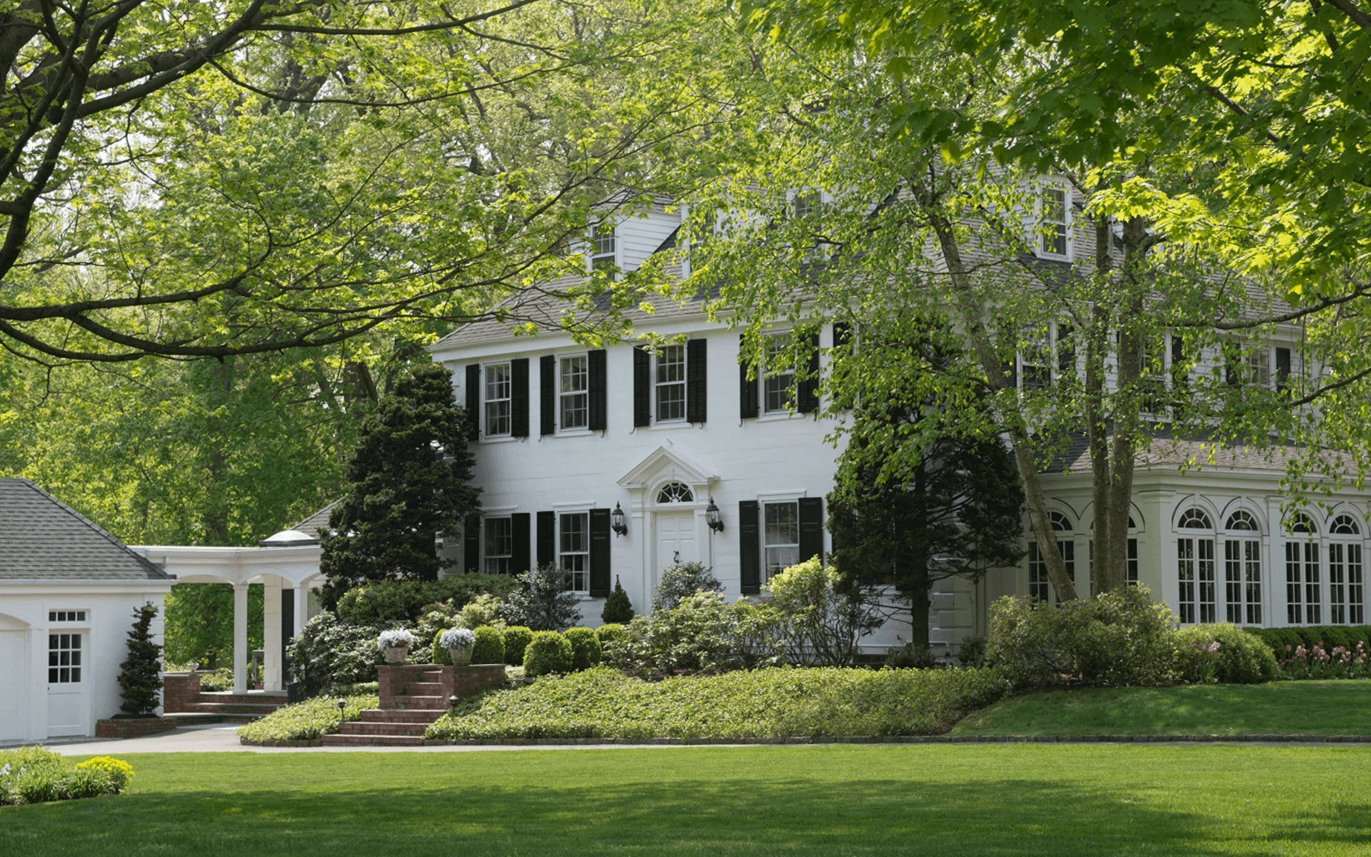 Riverside waterfront home with a dock, or sailboats at the yacht club
