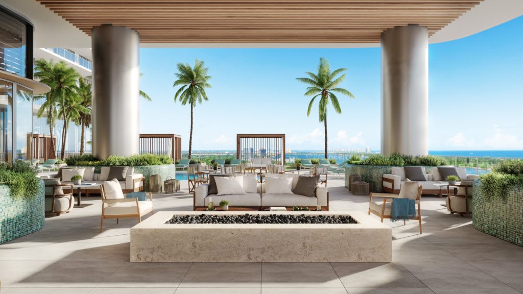 Pre construction rendering of pool area overlooking ocean and intracoastal