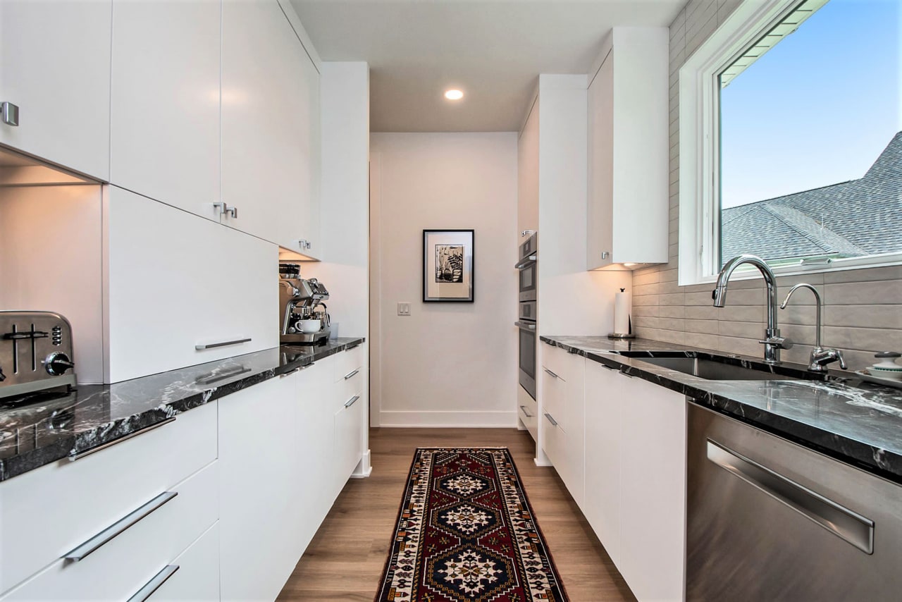 white cabinets and kitchen sink