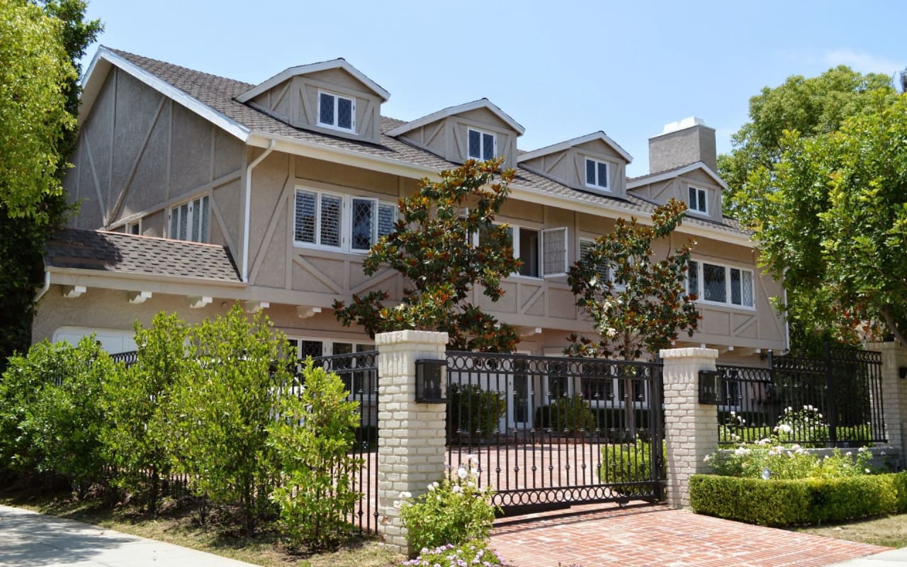 large house with closed gate