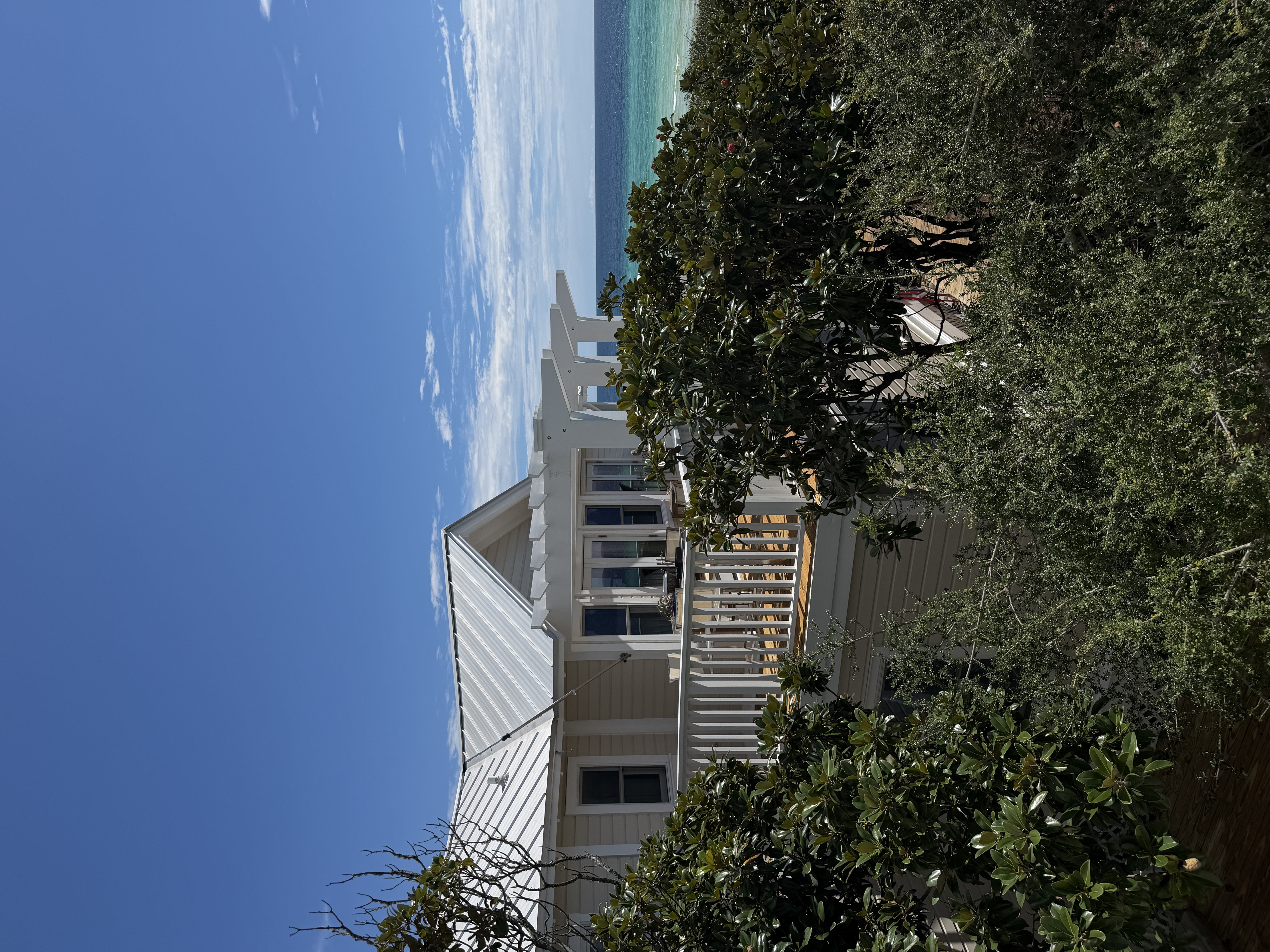 White coastal balcony overlooking the Gulf of Mexico in Seaside Florida