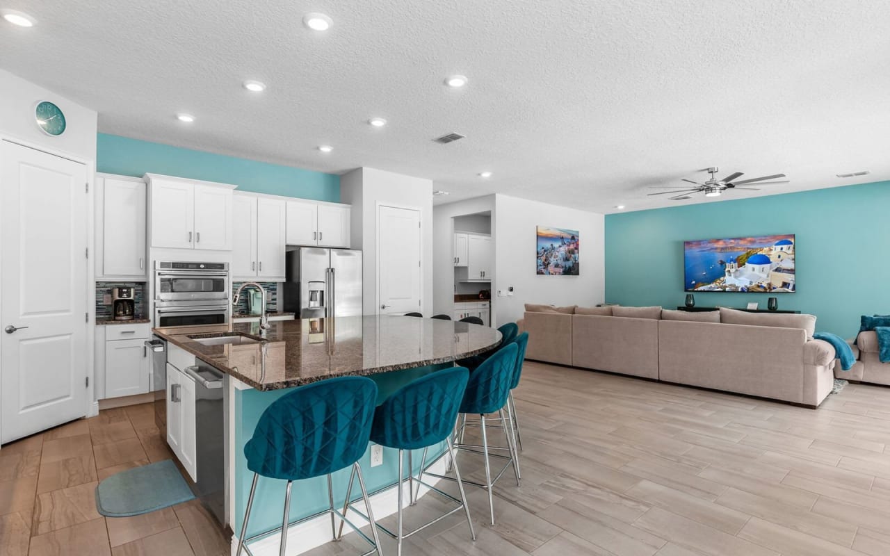 A modern open-plan kitchen with a large central island.