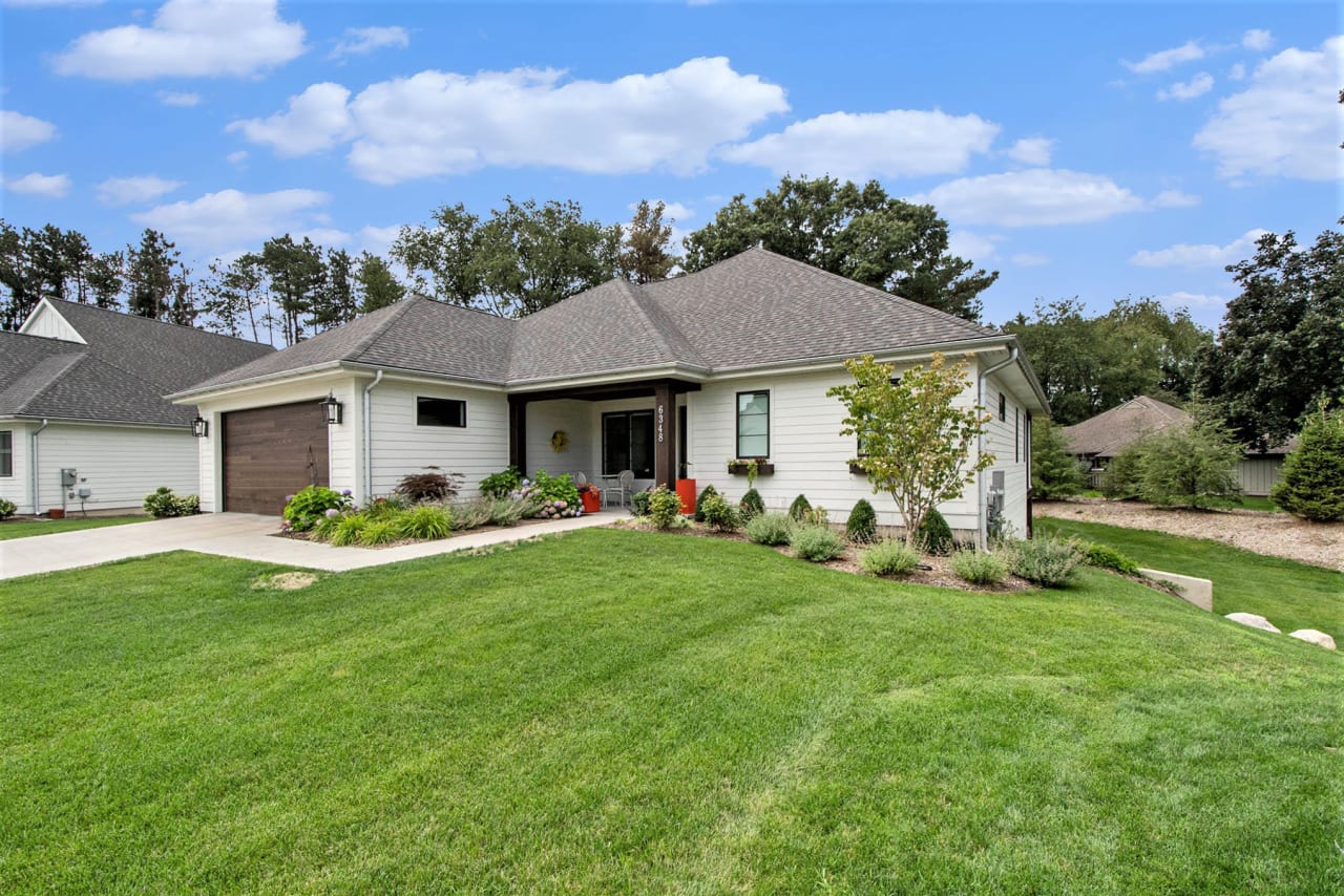 single family house exterior with green lawn