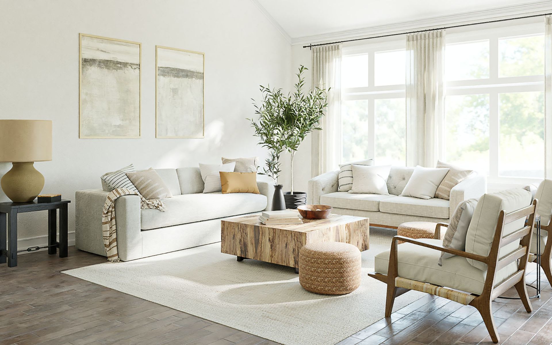  A brightly lit modern living room features a large, light-colored sofa with throw pillows in varying shades of cream and light brown