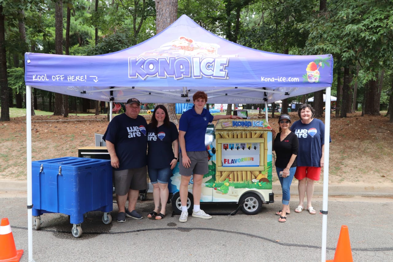 Kona Ice cream tent with 5 people underneath