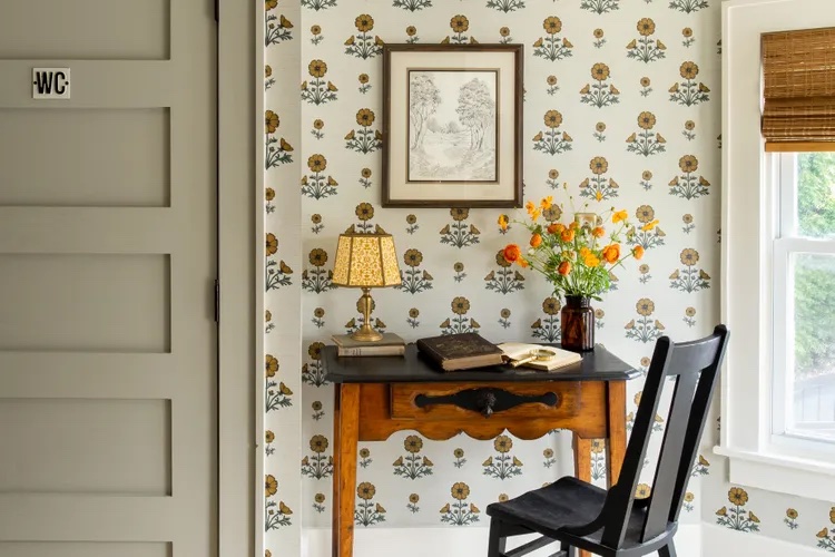 Bedroom with floral block print wallpaper by Chasing Paper, a leading pattern in 2026 interior design