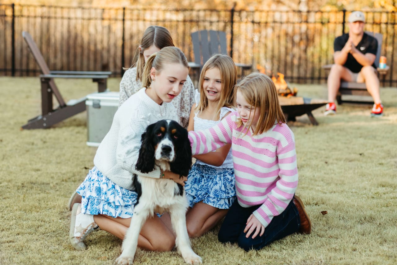 Kids Playing With Pet In Glenview Park