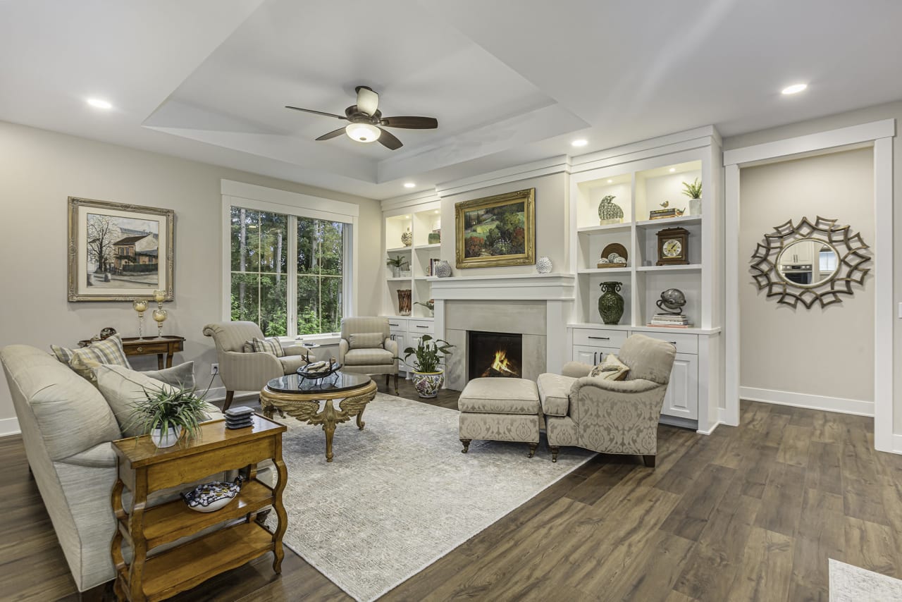 living area with couches and fireplace and coffee table