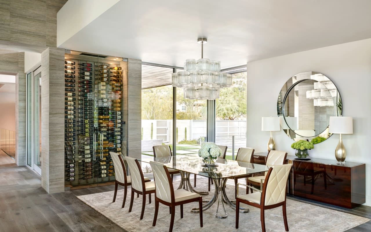 Custom luxury modern estate with custom wine rack and dining room