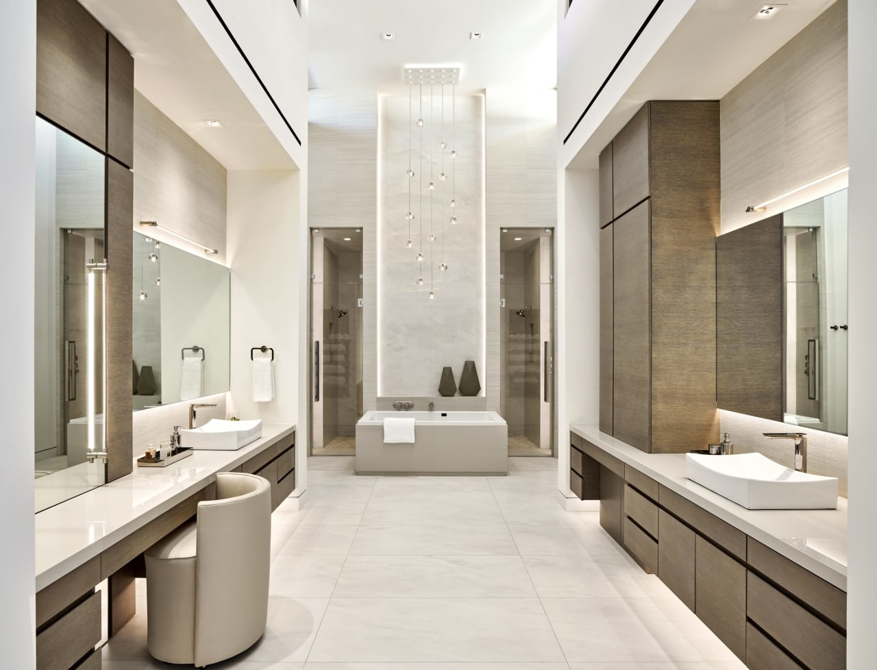 Luxury modern estate with his and her bathroom with floating sinks