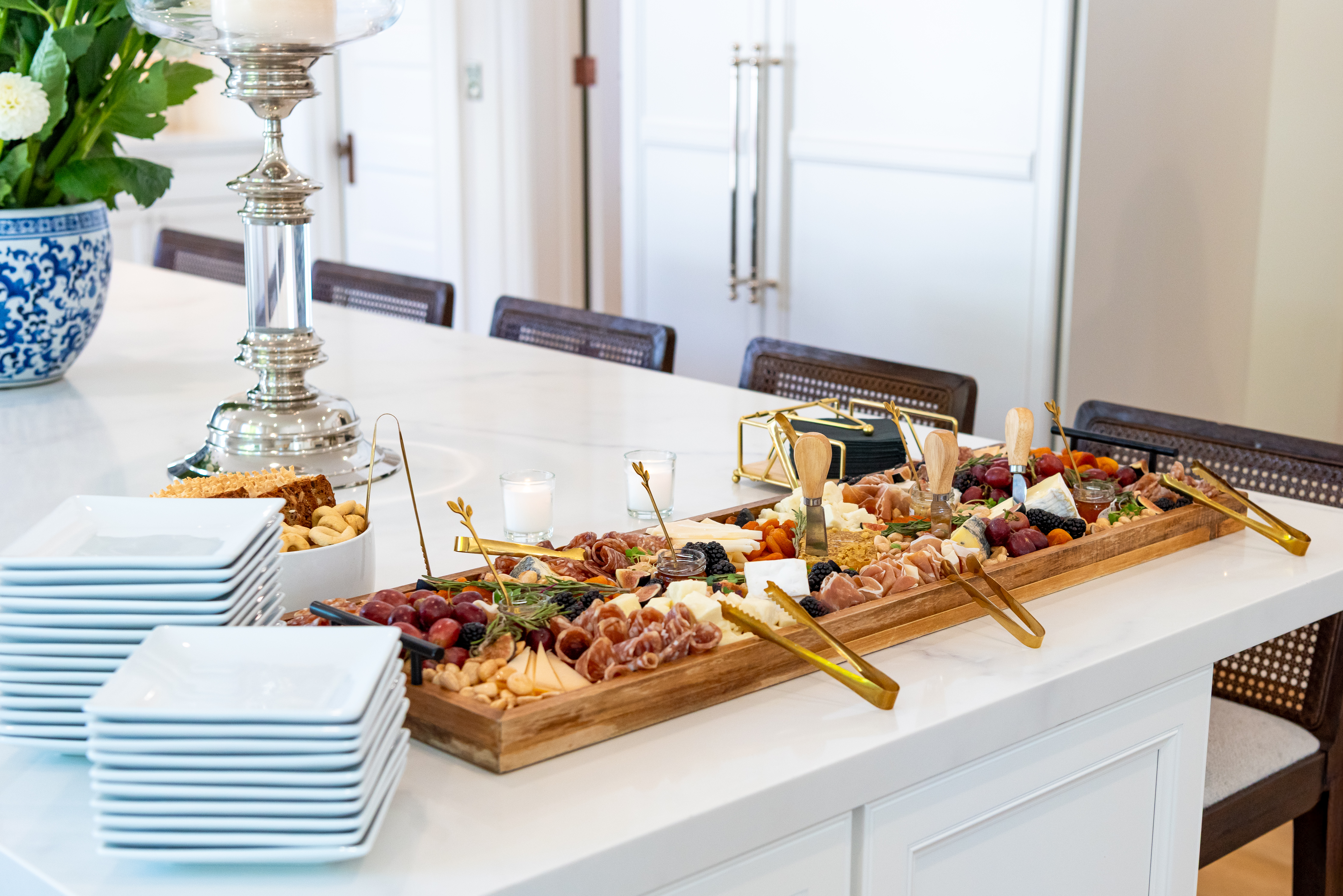 Charcuterie board on the white kitchen island