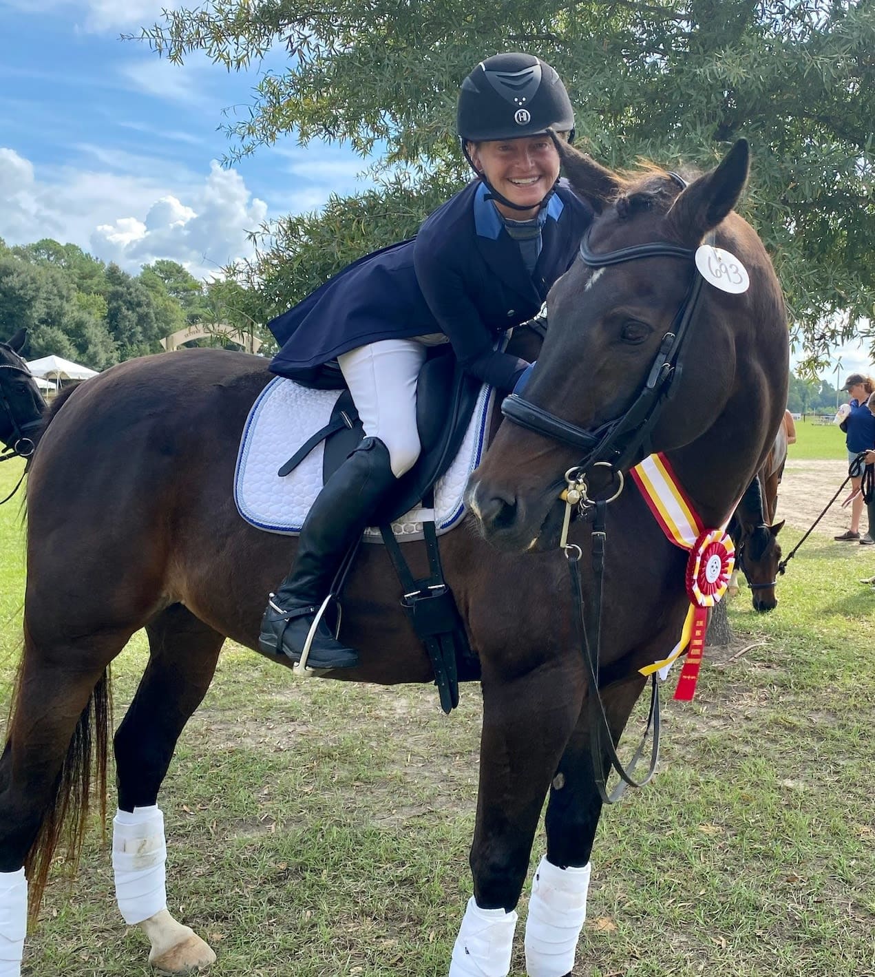 real estate expert Jamie riding a horse