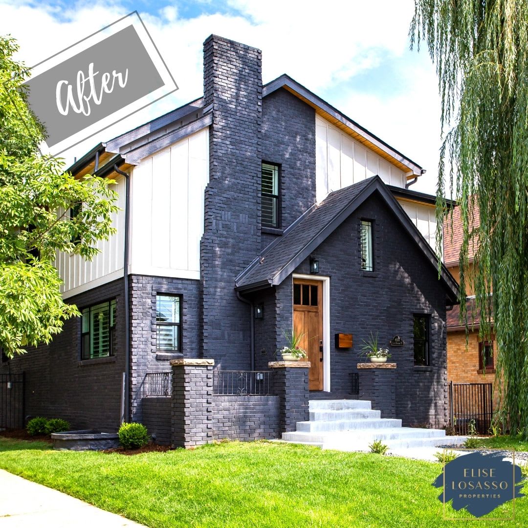 The house now features dark gray or black brick on the lower level and a tall, prominent chimney