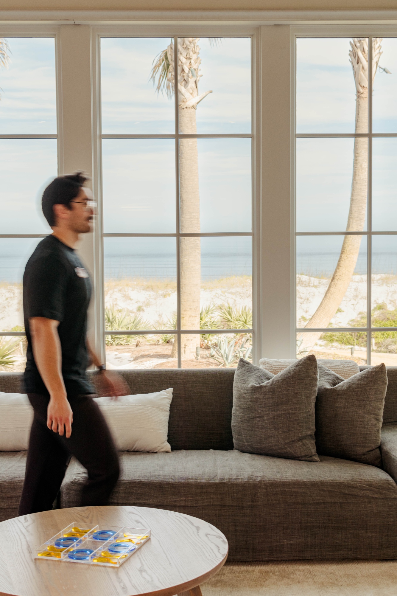 Man Walking Through the Living Room