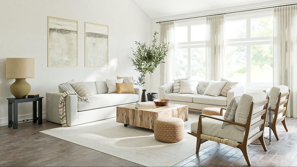 Minimalist living room with white sofas, wood furniture, and large windows.