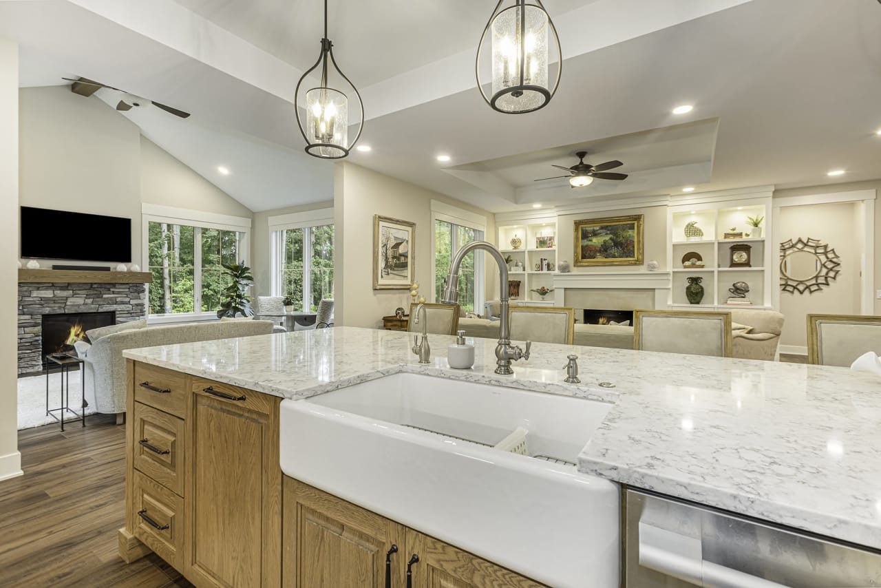 kitchen counter with sink and pendant lightings