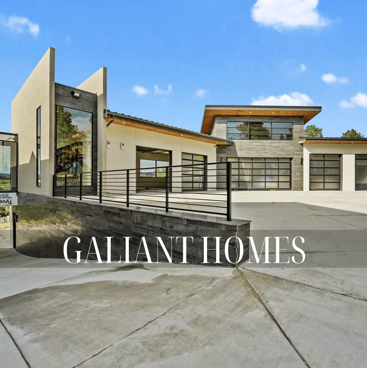 Modern home exterior with large glass windows and a flat roof, and text overlay that reads 'GALLIANT HOMES.