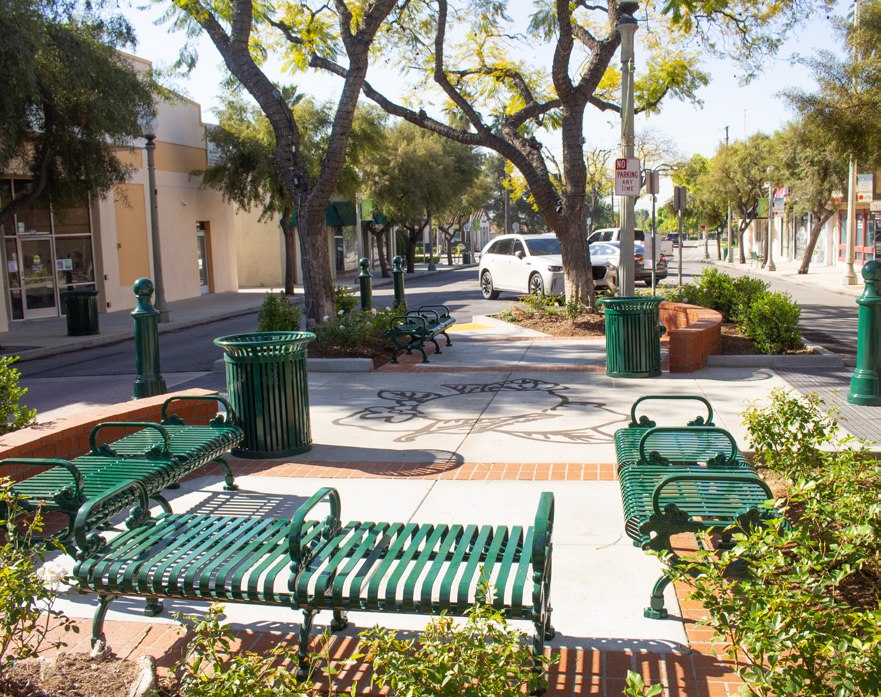Benches, trees and storefronts in downtown Upland
